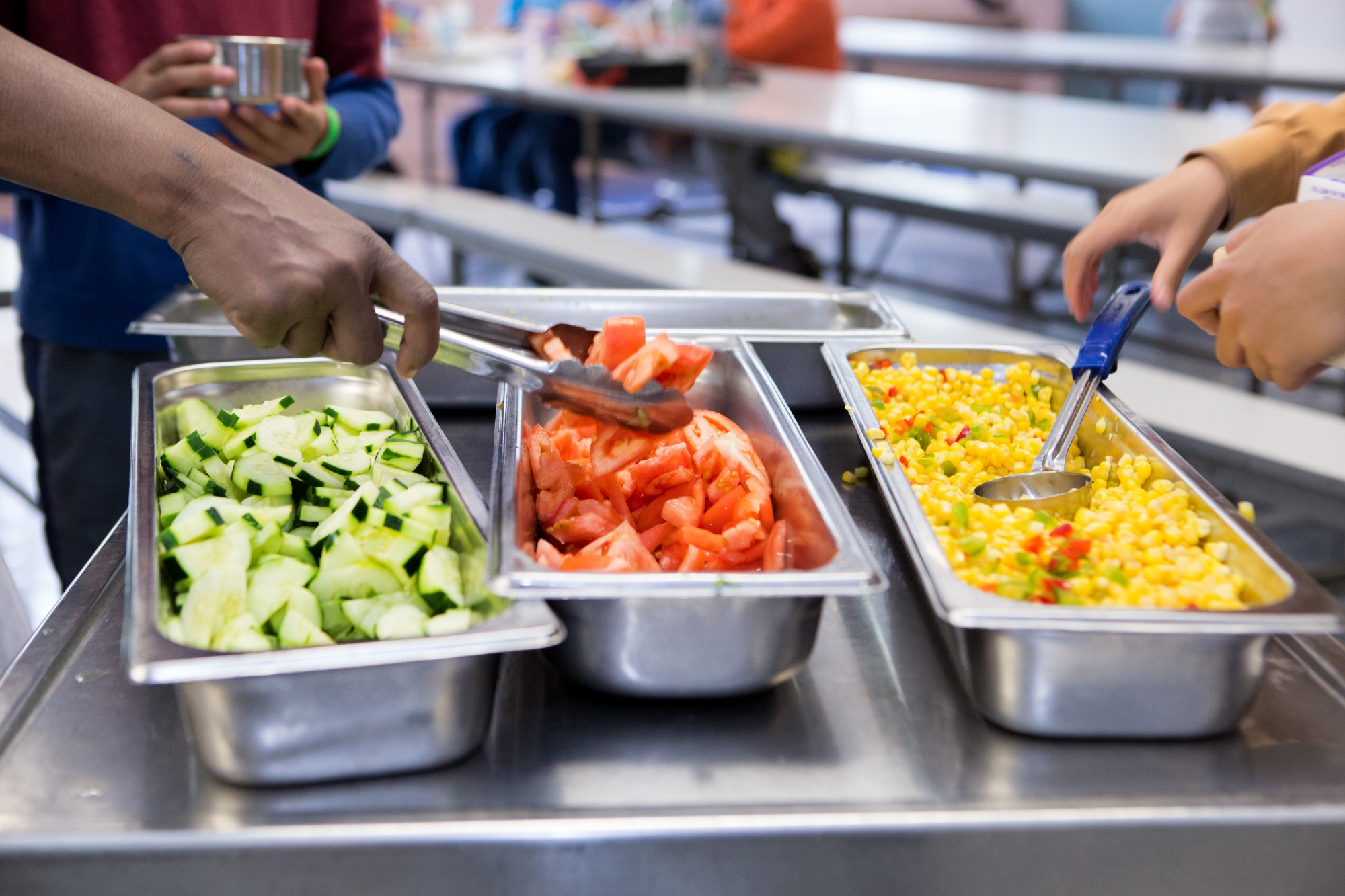 food tray of vegetables at school cafeteria